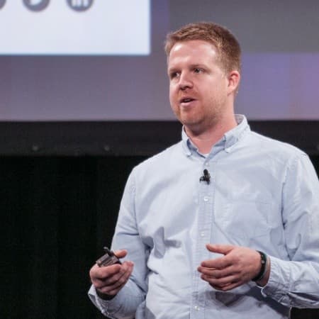 Rusty Walters speaking onstage